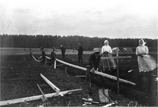 Subsurface drainage installation at Komarovka bog